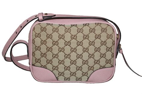 gucci pink crossbody purse.